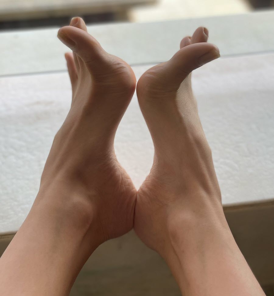 Sexy Bare Feet in a Window